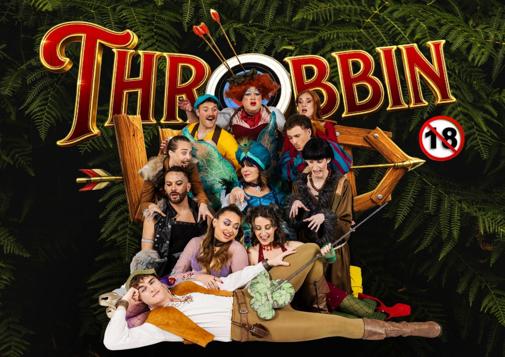 The Throbbin Wood cast in costume around the show logo, Zealous Productions adult pantomime 2026
